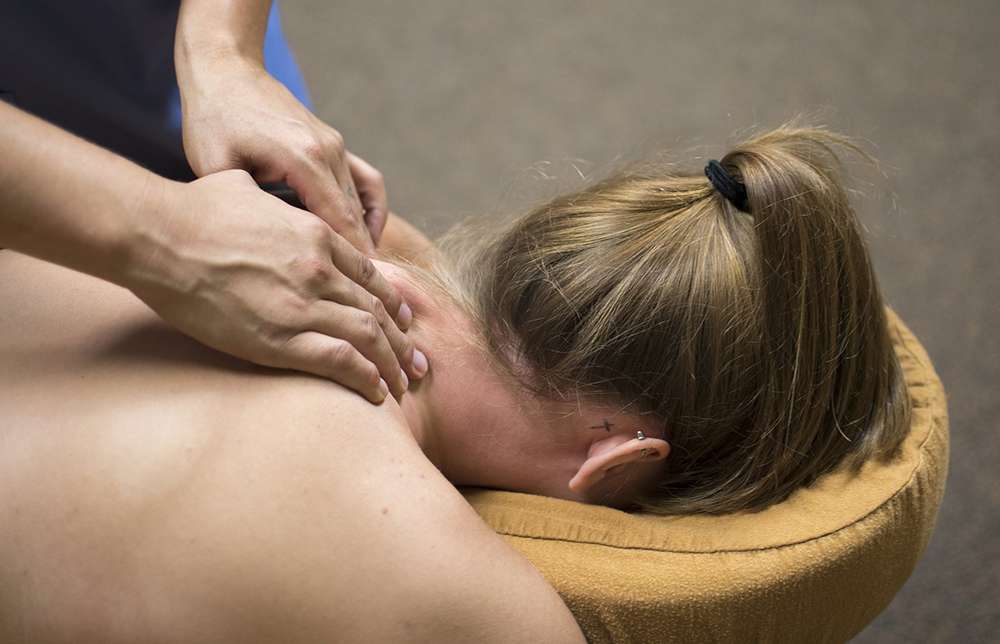 male client is taking full body therapy at faisalabad's best massage center